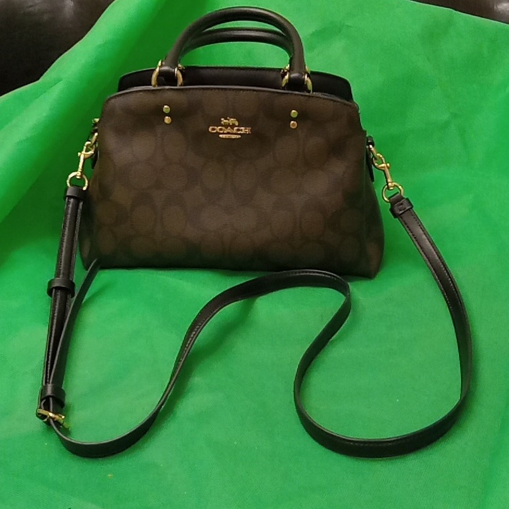 Coach brown small handbag,only wore a few times.